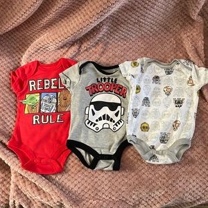 3 Star Wars themed onesies